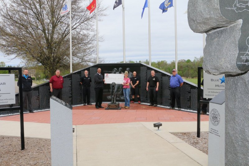 Military Veterans of Robroy Enclosures’ Fly First Flag on New Flagpole